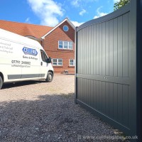A bespoke aluminium gate with a grey powder coating, fitted on a client’s driveway in Merseyside.