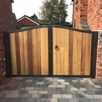 An installation near Preston for a bespoke hardwood, timber infill driveway gate.