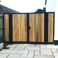 This bespoke steel frame driveway gate with iroko timber infill was delivered and installed at a property near Preston.