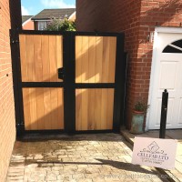 A bespoke timber infill side gate, created with a steel frame and matching side panels for a property in Standish, Wigan.