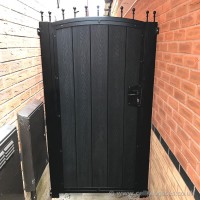 A black wood effect, composite garden gate fitted at the side of a client’s property in Wigan.