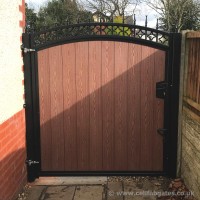 A bespoke, wood effect UPVC garden gate installation at a property in Wigan, Greater Manchester.