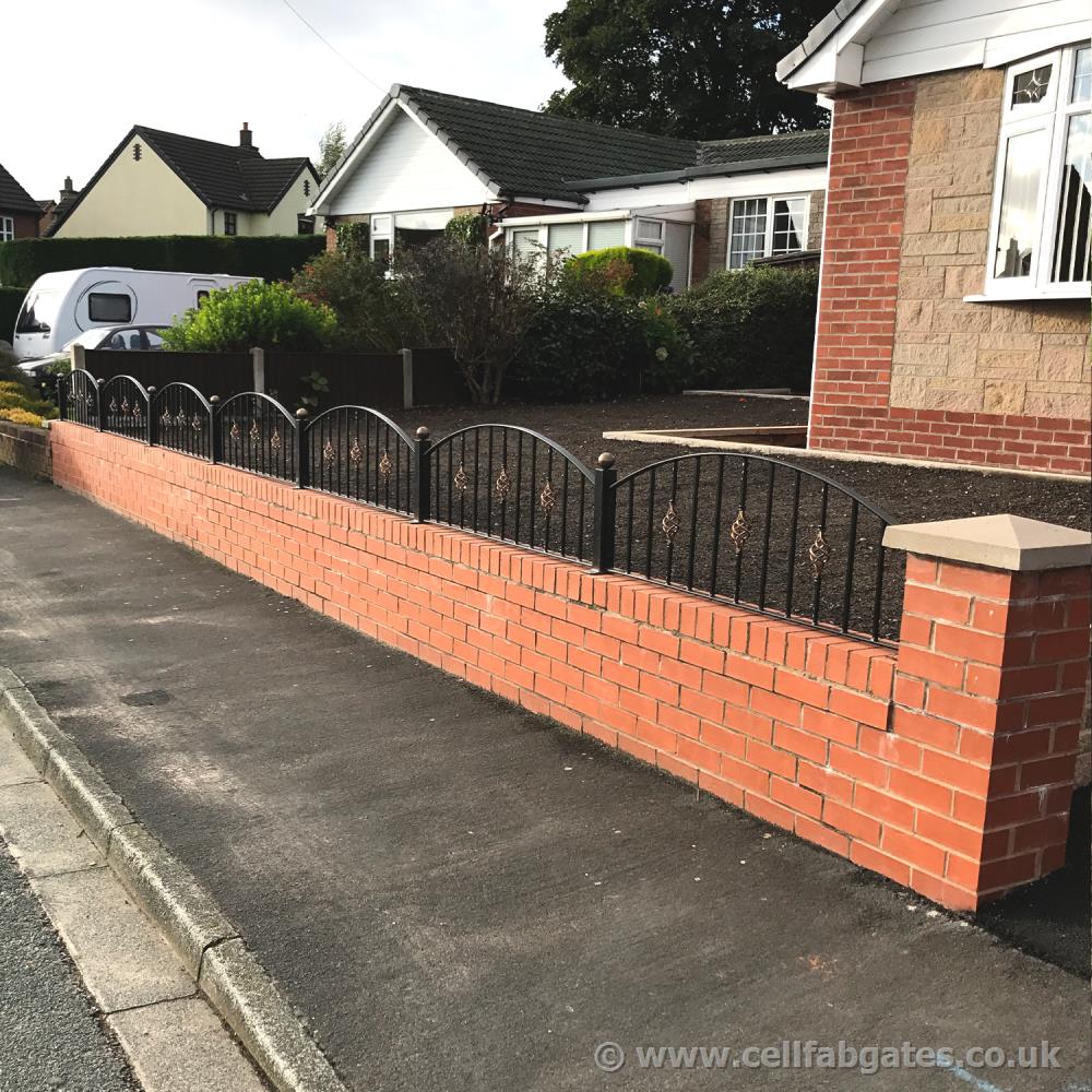 These bespoke iron wall railings were created with deceptive baskets and installed at a home  in Eccleston near Chorley.