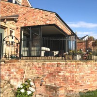 These bespoke iron railings were created with ornate ironwork and installed on a terrace area in Mawdsley, Lancashire.