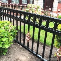 A set of bespoke garden railings, created in wrought iron and installed at a home in Lancashire.